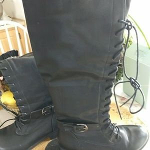 Black boots with ties on the front